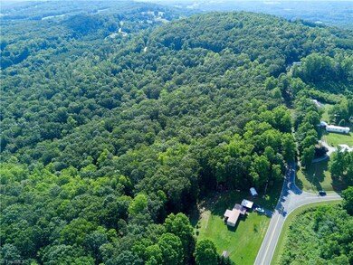 Driveway entrance opposite Epperson Road at sign. Epperson Road coming onto Mount Hermon Church road.