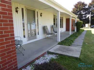 Wonderful front porch to relax and read a book.