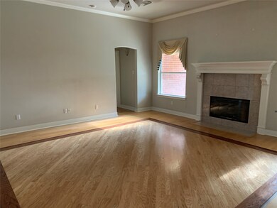 this picture and the next one show the large living room and the eye catching floor design.
