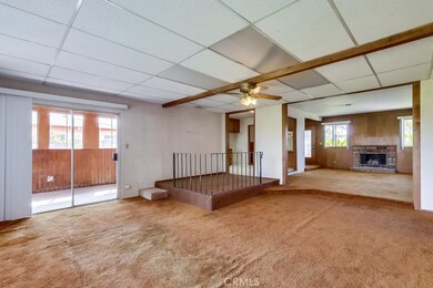 bonus room with raised dining area and slider with access to utility area and back yard