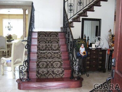 Outside covered entry leads to the front door and 