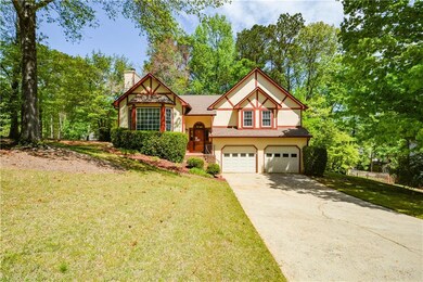 View of front of property featuring concrete drive