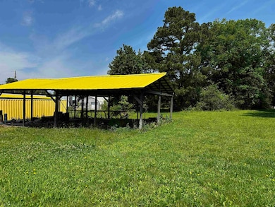 Pole Barn with a lawn