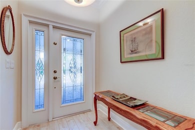 Leaded Beveled Glass door and sidelight provide a welcoming entrance