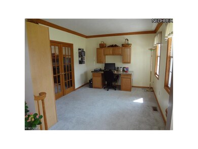 Sunken living room off on the right. French doors 