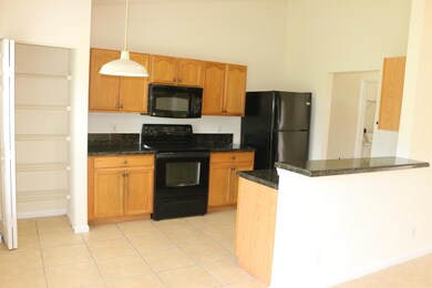 4110 SW Jarmer Rd, Port Saint Lucie, FL 34953 - photo 2