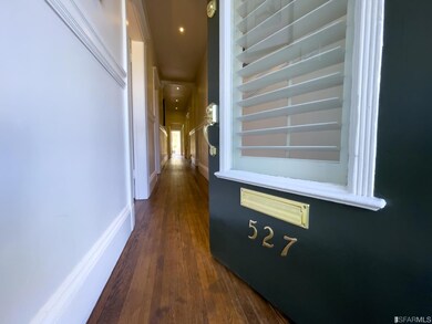 527 is the vacant lower full floor flat
