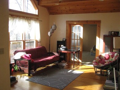 Living Room w/ Cathedral Ceiling