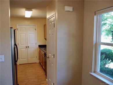 Efficient galley-style kitchen with pantry and ple