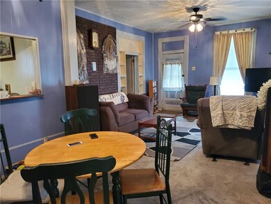 Dining room looking into living room