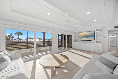 Living room with light hardwood / wood-style floor