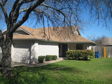 View of front of home with an attached garage