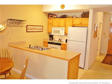 Kitchen. Galley style kitchen opens directly into