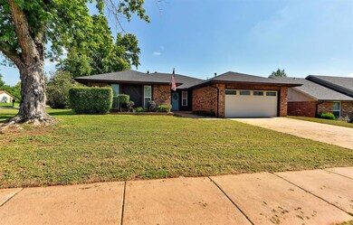 View of front of property featuring a garage and a