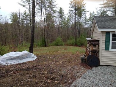 knoll to left of shed