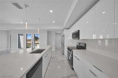 1102 Santa Barbara Blvd N, Cape Coral, FL 33993 - photo 3