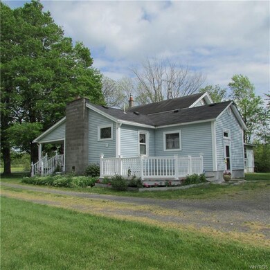 Exterior side view with sitting deck