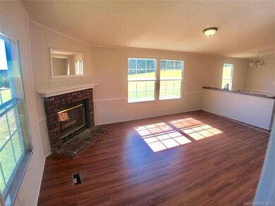 One of the family rooms off of the kitchen and ope