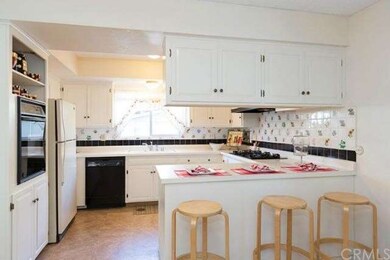 Sunny kitchen with breakfast bar