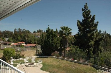 Rear view overlooking neighborhood.