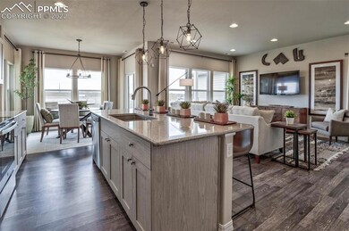 Open concept main level. Photos are from a model a