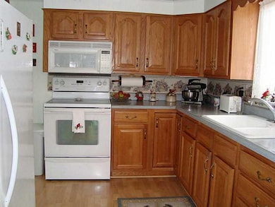 Kitchen. Nicely updated kitchen with newer white a