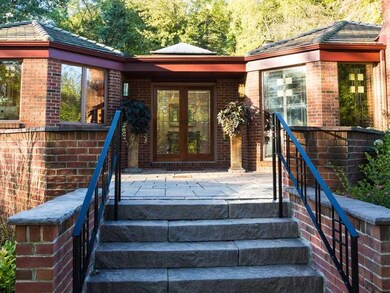 Exterior Front. Custom designed beveled glass door