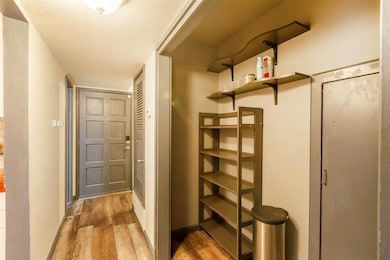 Doorway to outside featuring wood finished floors