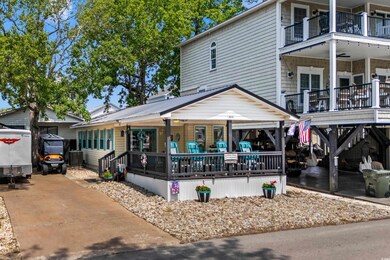 View of front of property with covered porch and a