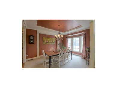 The large, formal dining room easily accommodates 