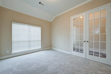 Lovely office with beautiful natural light and French doors.