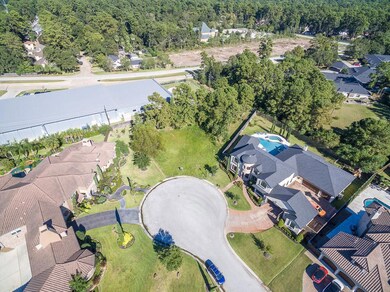 This homesite is located a few steps away from the community lake, pictured at the upper-right of this photo.