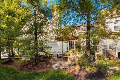 Paver Patio Surrounded By Mature Trees