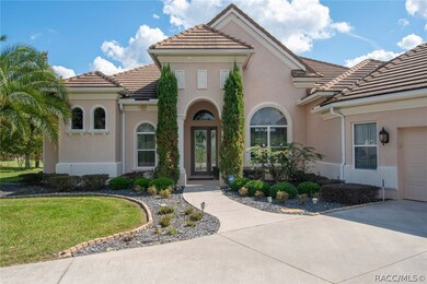 Tall entryway with glass doors makes for a welcomi