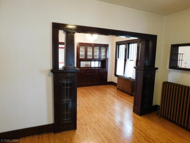 The built-in room dividers have original leaded gl