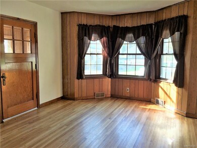 Bright bay-window in Living Room.
