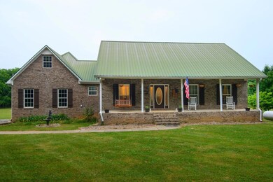 Rocking chair front and back porches..Metal roof and low maintenance