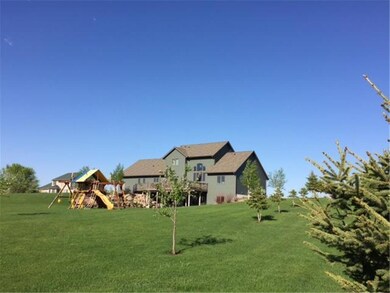 Back of home with HUGE back yard