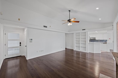 Unfurnished living room with ceiling fan, recesse