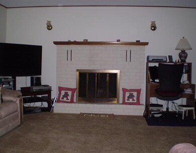Living Room. Brick fireplace