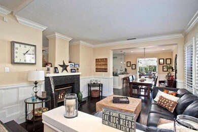 Bright entry steps down to living and dining room 