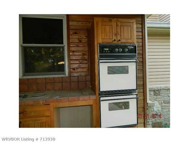 Exterior Back. outdoor kitchen