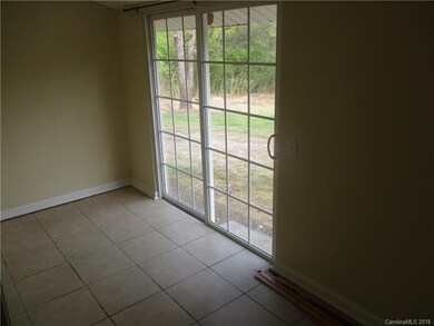 Laundry room and sliding door to outside and huge 