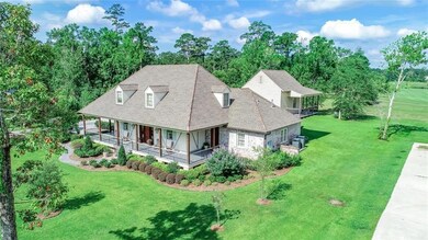 Aerial view of the home with the back balcony off