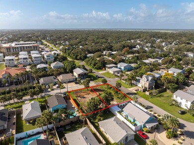Aerial view of residential area with property boundaries highlighted