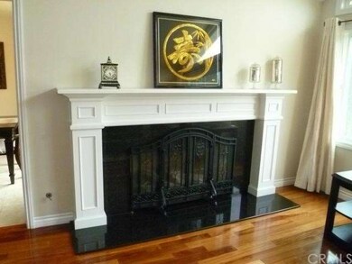 Large Fireplace with Mantle and Granite hearth