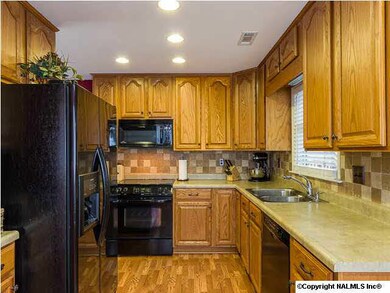 Fantastic kitchen with new dishwasher, recessed lights, updated hardware, and smooth ceiling