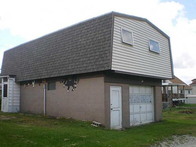 Parking Lot/Garage. The separate detached garage h