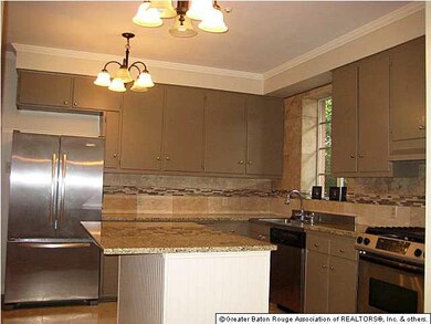 Updated kitchen with granite counters, including a
