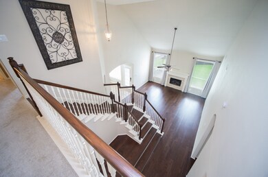 This lovely home offers an open floor plan with soaring ceilings and tons of natural light.